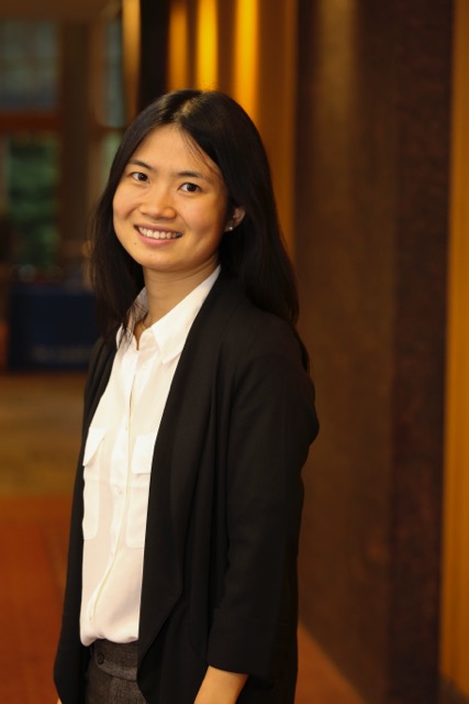 Photo: Dr. Hui Shen wearing black jacket and white shirt